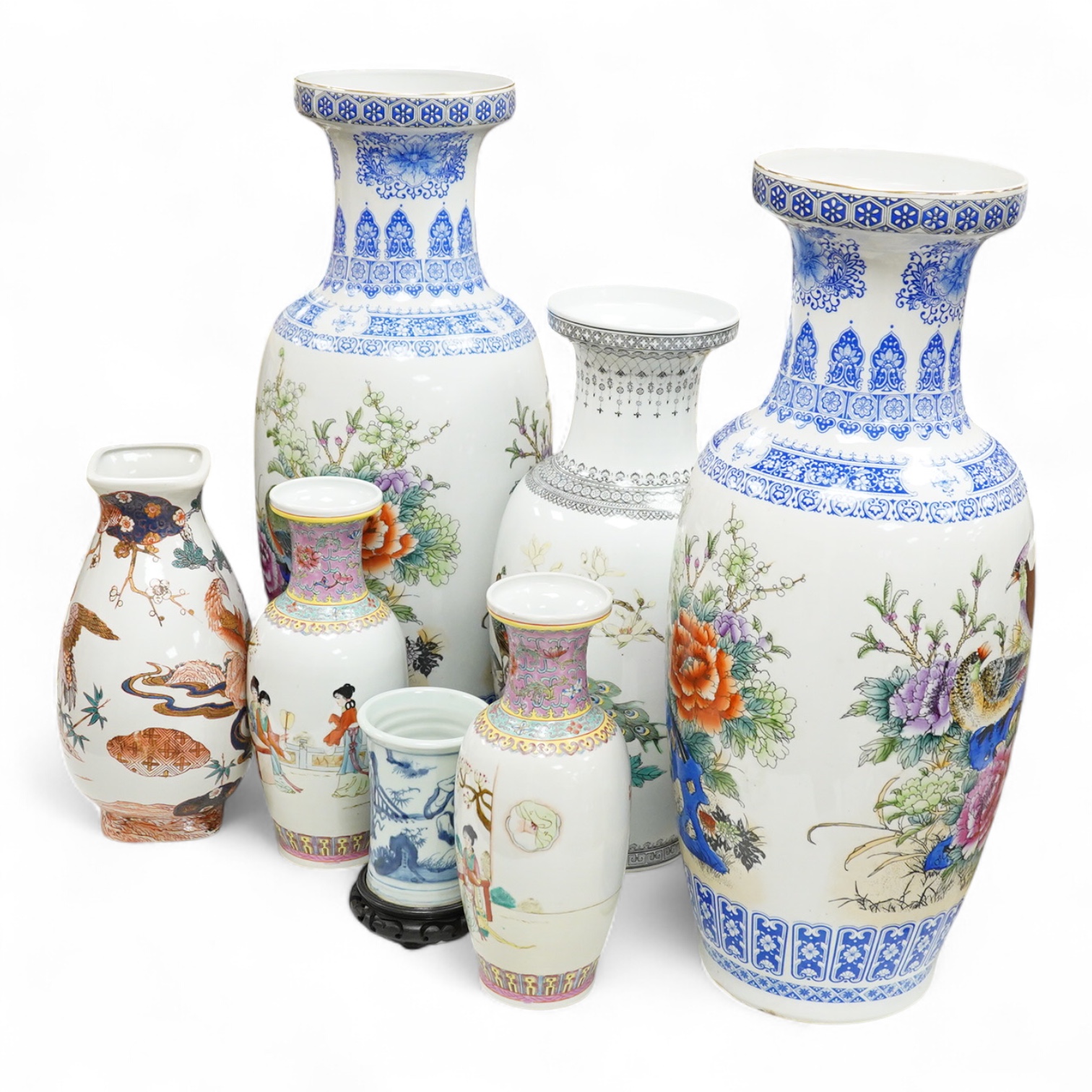 A large pair of Chinese polychrome vases, 60cm high, a pair of famille rose vases, a blue and white brushpot and two other vases (7).